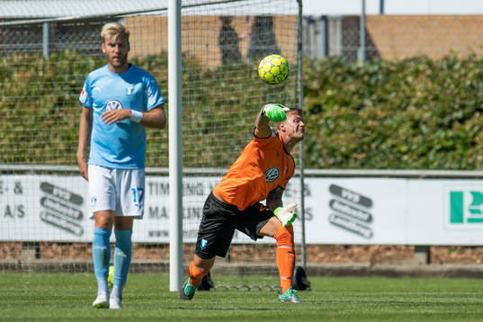 Malmö FFs goalkeeper Johan Dahlin and Rasmus Bengtsson