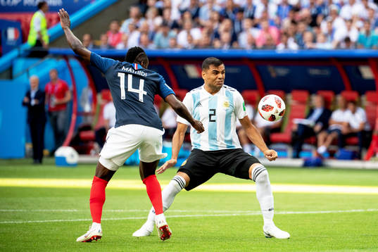 Gabriel Mercado of Argentina and Blaise Matuidi of France