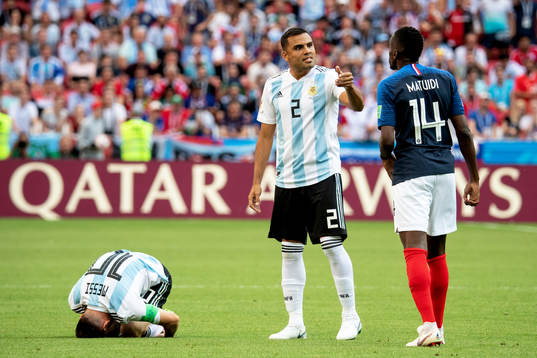 Lionel Messi, Gabriel Mercado of Argentina and Blaise