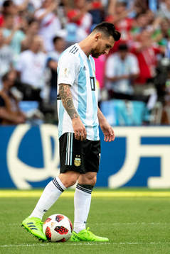 Lionel Messi of Argentina looks dejected