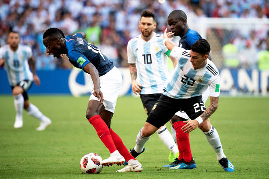 Cristian Pavon of Argentina and Blaise Matuidi of France