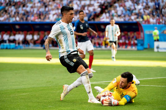 Enzo Perez of Argentina and goalkeeper Hugo Lloris of France