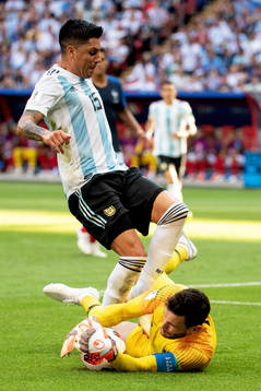 Enzo Perez of Argentina and goalkeeper Hugo Lloris of France