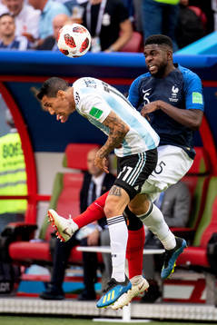 Angel Di Maria of Argentina and Samuel Umtiti of France