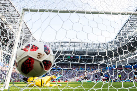 Angel Di Maria of Argentina scores 1-1 behind goalkeeper