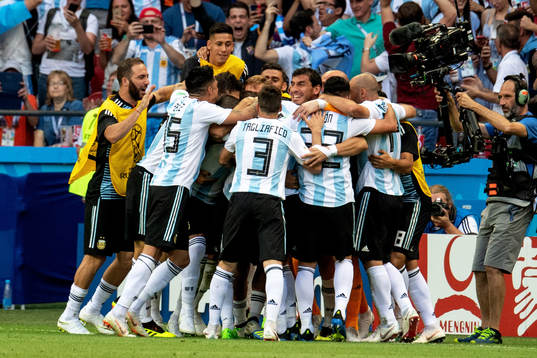 Lionel Messi of Argentina celebrates with his teammates