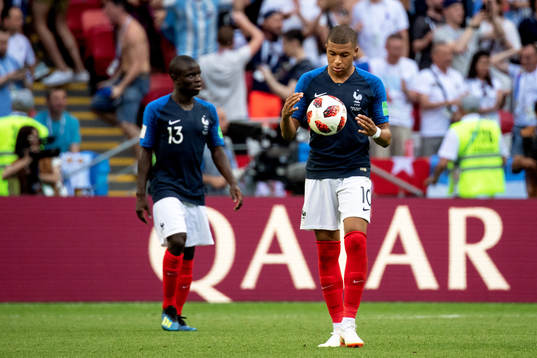 Kylian Mbappe of France looks dejected