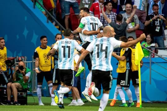 Lionel Messi of Argentina celebrates with his teammates