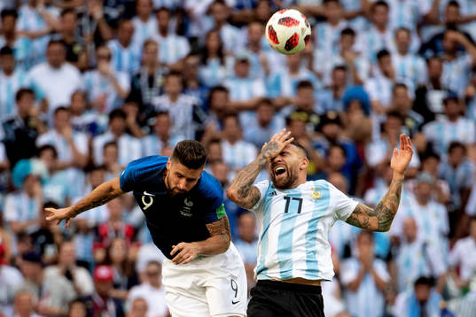 Olivier Giroud of France and Nicolas Otamendi of Argentina