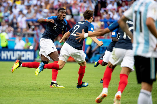 Benjamin Pavard of France celebrates with his teammates