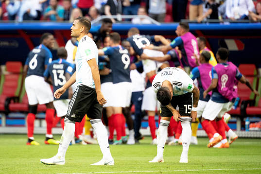 Benjamin Pavard of France celebrates with his teammates