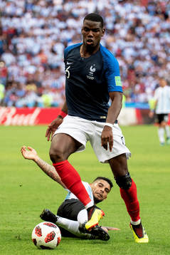 Paul Pogba of France and Ever Banega of Argentina