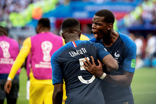 Samuel Umtiti and Paul Pogba of France celebrates