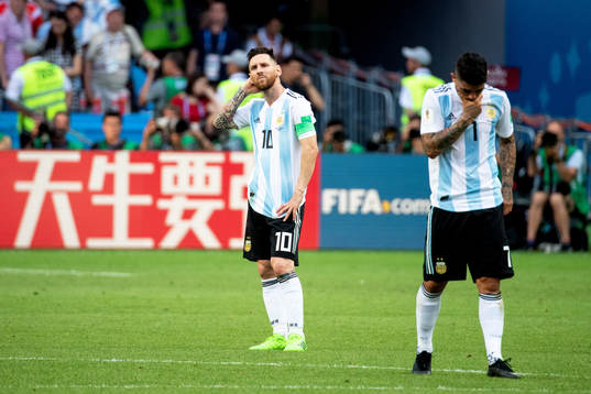 Lionel Messi of Argentina looks dejected