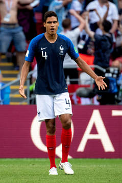 Raphael Varane of France looks dejected