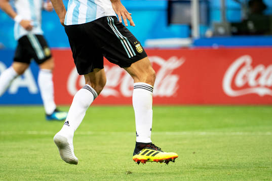 Federico Fazio of Argentina without a shoe
