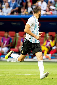 Federico Fazio of Argentina without a shoe