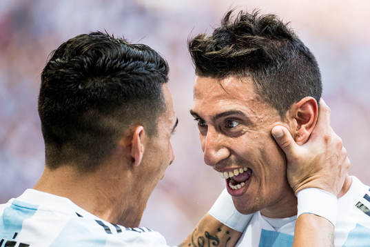 Angel Di Maria of Argentina celebrates with Cristian Pavon