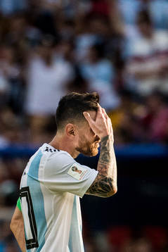 Lionel Messi of Argentina looks dejected