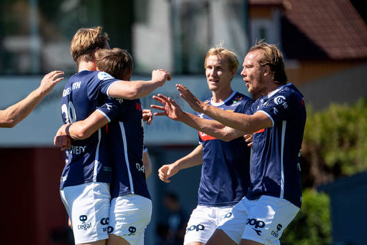 Kristian Thorstvedt of Viking celebrates with his teammates