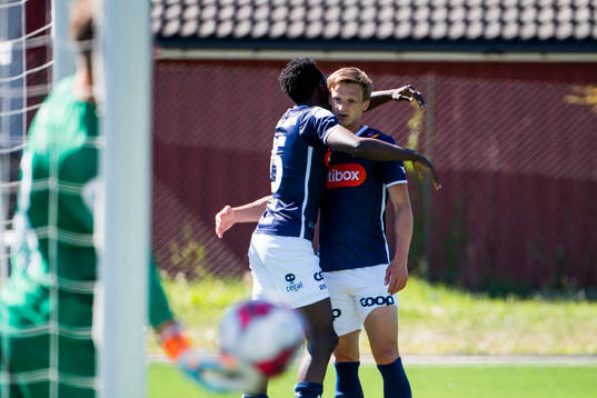 Usman Sale of Viking celebrates