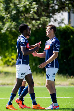 Usman Sale of Viking celebrates