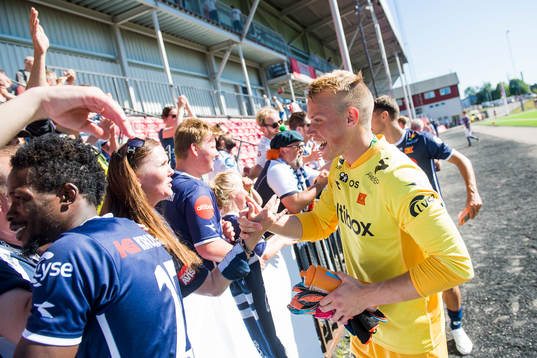 Goalkeeper Amund Wichne of Viking celebrates
