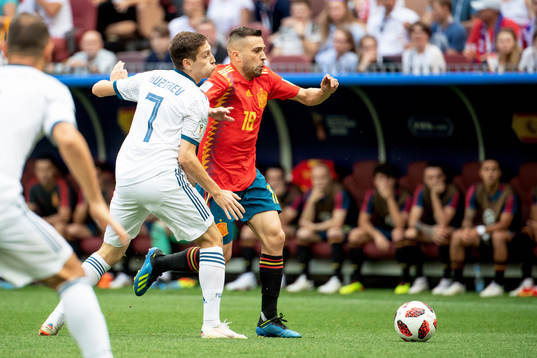 Daler Kuziaev of Russia and Jordi Alba of Spain