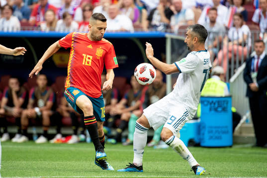 Jordi Alba of Spain and Alexander Samedov of Russia