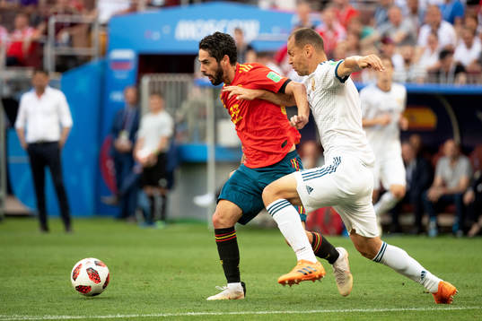 Isco of Spain and Sergey Ignashevich of Russia