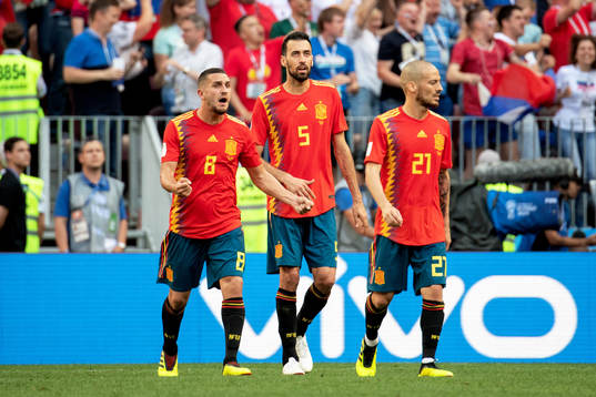 Koke, Sergio Busquets and David Silva of Spain looks