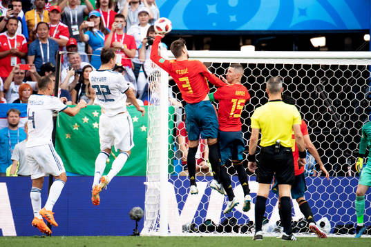 Handball by Gerard Pique of Spain