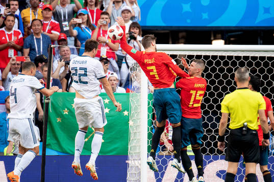 Handball by Gerard Pique of Spain