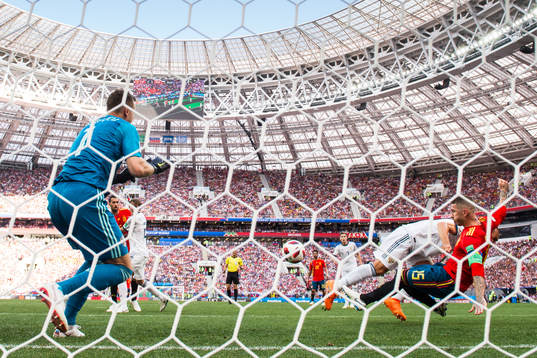 Sergio Ramos of Spain scores 1-0 behind goalkeeper Igor