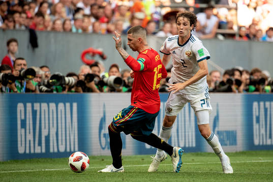 Sergio Ramos of Spain and Fernandes Mario of Russia