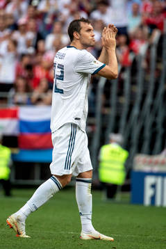 Artem Dzyuba of Russia leaves the pitch