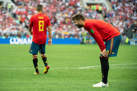 Gerard Pique of Spain looks dejected