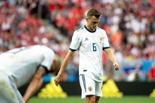 Denis Cheryshev of Russia looks dejected