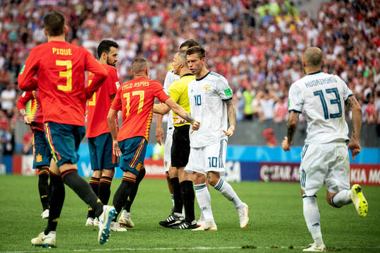 Iago Aspas of Spain and Fedor Smolov of Russia