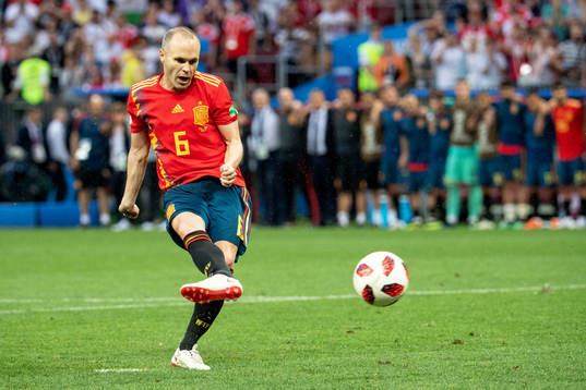 Andres Iniesta of Spain shoot a penalty