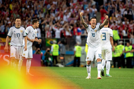 Fedor Smolov of Russia celebrates with his teammates