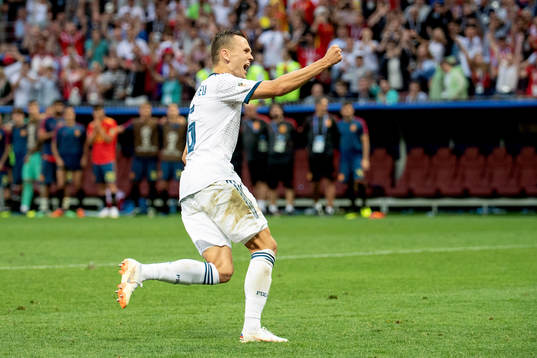 Denis Cheryshev of Russia celebrates