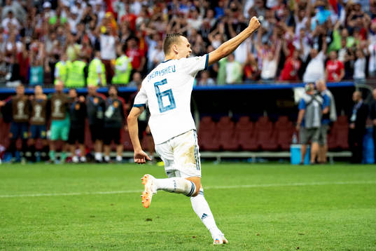 Denis Cheryshev of Russia celebrates