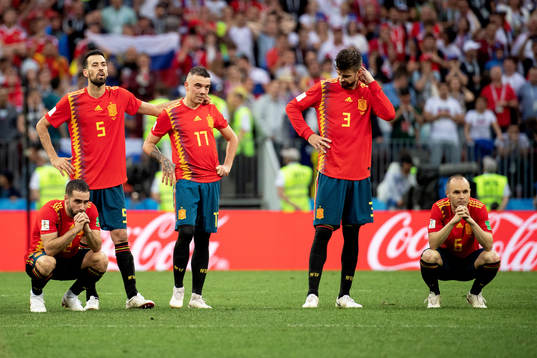 Players of Spain looks dejected