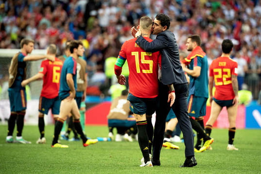 Sergio Ramos and head coach Fernando Hierro of Spain looks