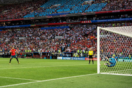 goalkeeper Igor Akinfeev of Russia saves a penalty from