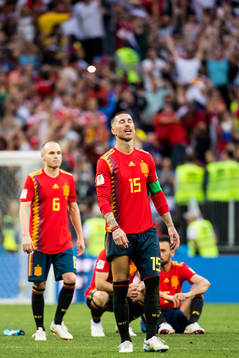 Sergio Ramos and Andres Iniesta of Spain looks dejected