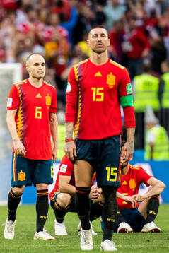 Andres Iniesta and Sergio Ramos of Spain looks dejected