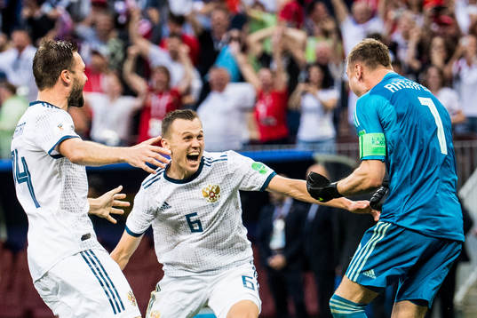 Vladimir Granat, Denis Cheryshev and goalkeeper Igor
