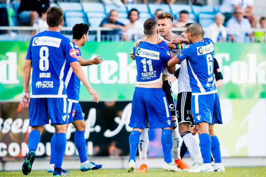 Nicklas Bendtner of Rosenborg and Flamur Kastrati of